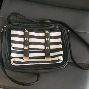 Under One Sky Black and White Crossbody Bag with Striped Design
